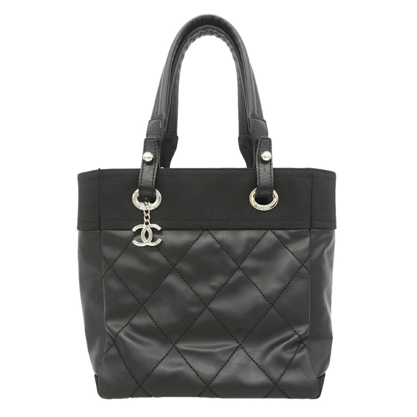 Canvas tote bag by Chanel: Canvas tote bag by Chanel Canvas tote bag by Chanel, crafted from high-quality canvas and featuring sleek silver hardware, is a timeless and sophisticated accessory. Measuring 27cm x 26cm x 11cm, this