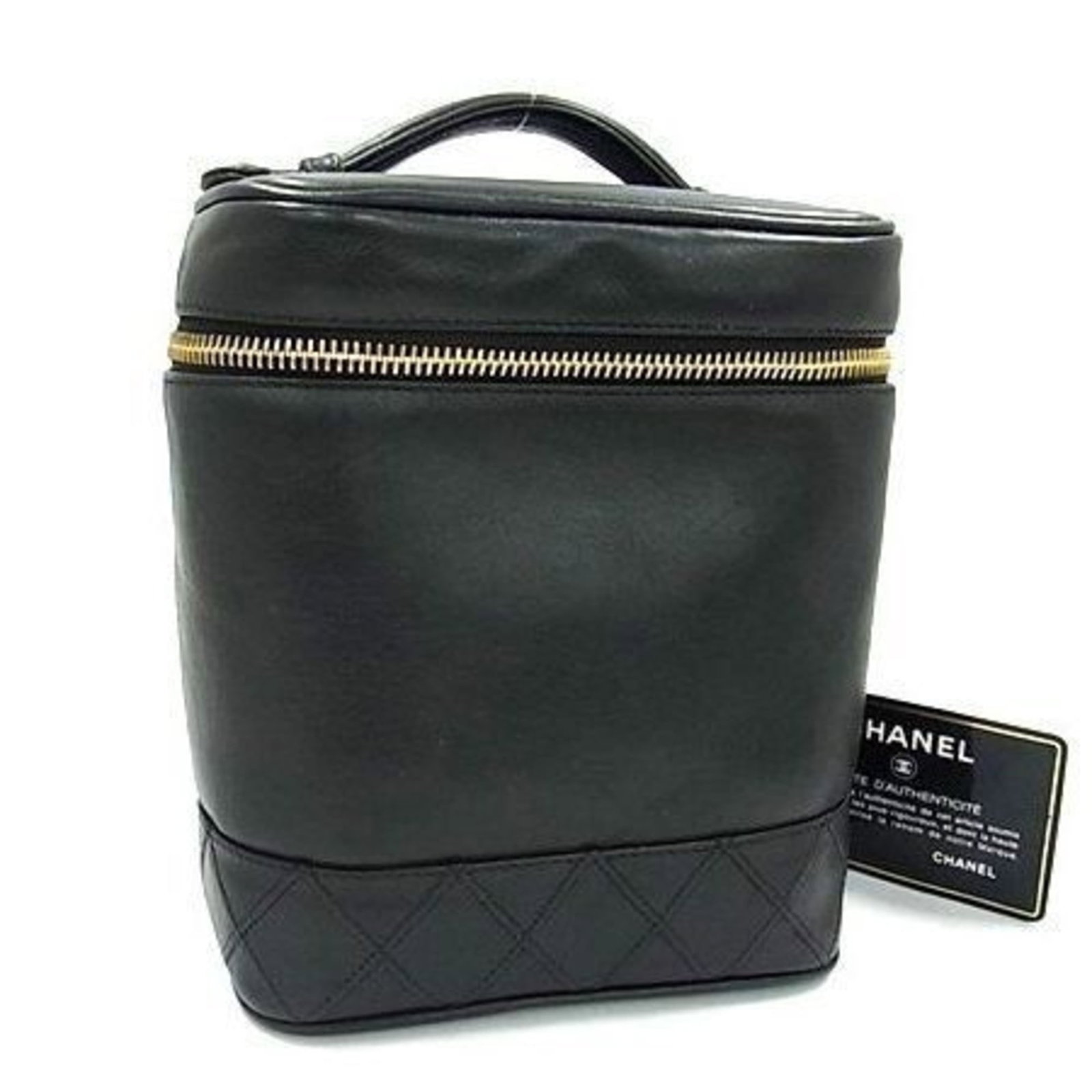 Vanity leather bag handbag Chanel: Vanity leather bag handbag Chanel Black lambskin vanity bag from Chanel, measuring 17cm x 14.5cm x 12cm. This luxurious leather bag features a sleek design and premium materials, making it a stylish