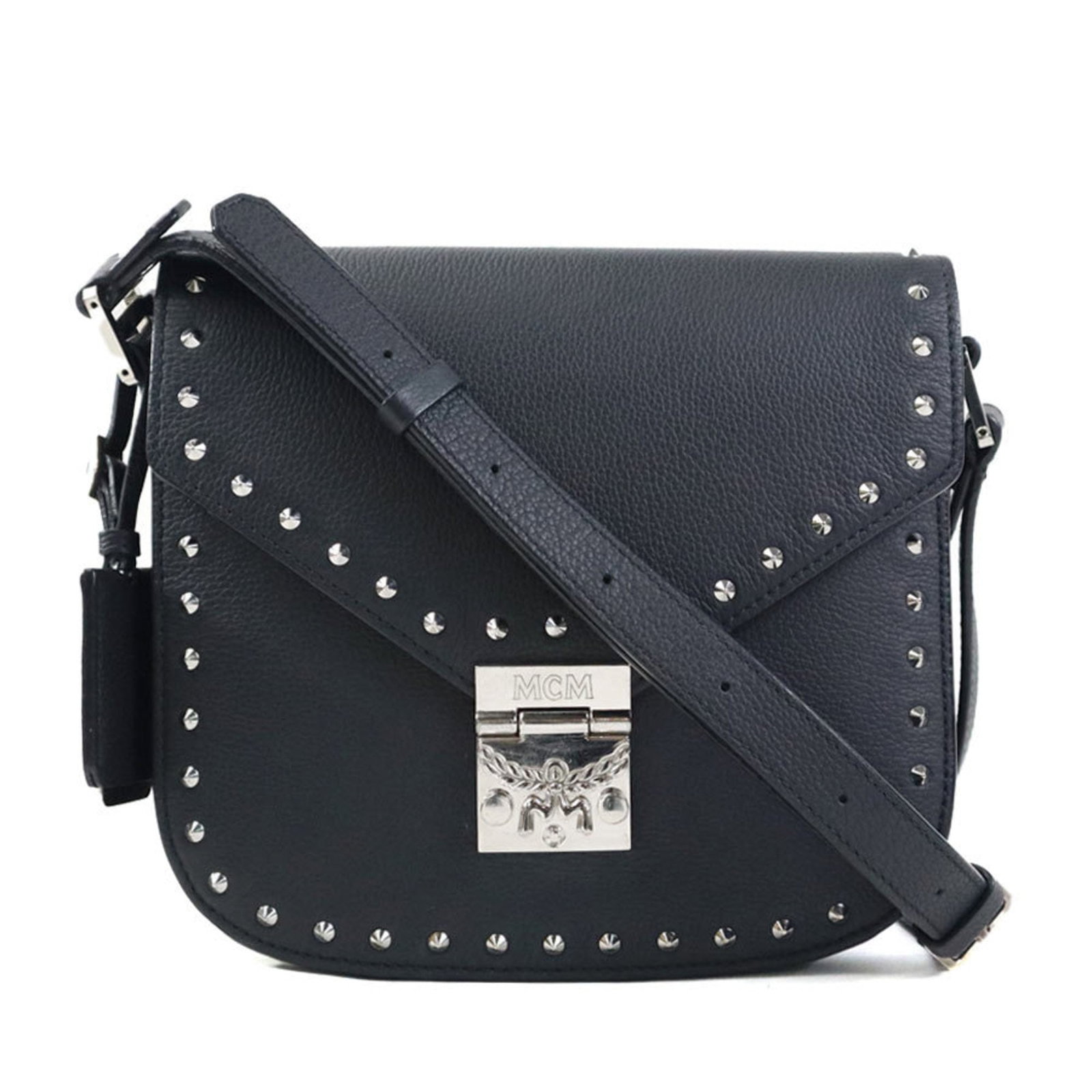 Leather Mcm Shoulder Bag: Leather Mcm Shoulder Bag The Leather MCM Shoulder Bag is a sleek and sophisticated accessory, crafted from high-quality leather in a timeless black hue. The bag's compact size and stylish charm make