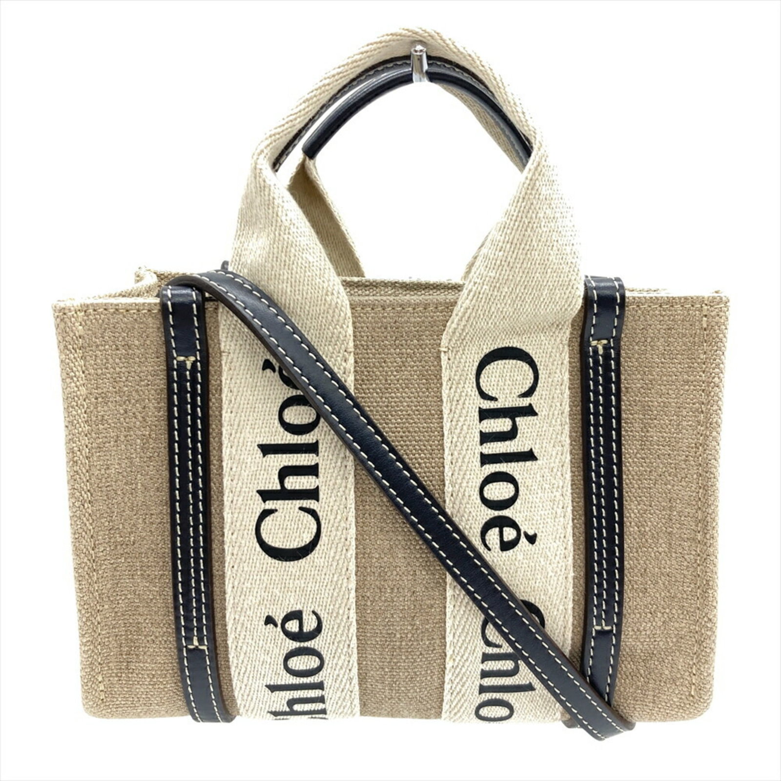 Linen Shoulder Bag Chlo: Linen Shoulder Bag Chlo Linen shoulder bag Chlo boasts a classic design with a natural beige hue, crafted from high-quality linen material. The bag's compact size and stylish silhouette make it a