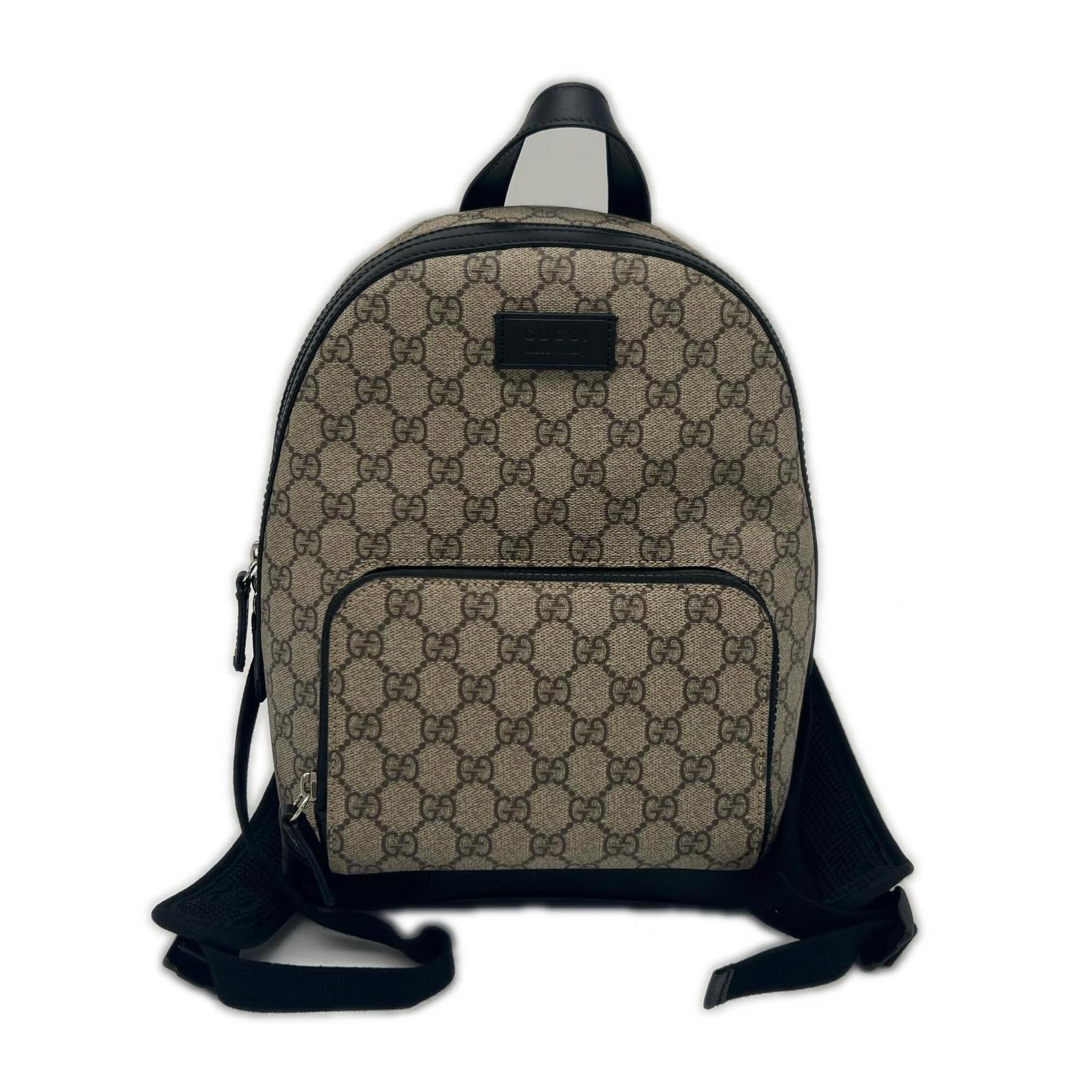 Canvas Leather Backpack: Canvas Leather Backpack Canvas Leather Backpack in Beige Brown. This Gucci backpack features a sturdy canvas and leather construction, with a classic zipper closure and adjustable strap length. Measur