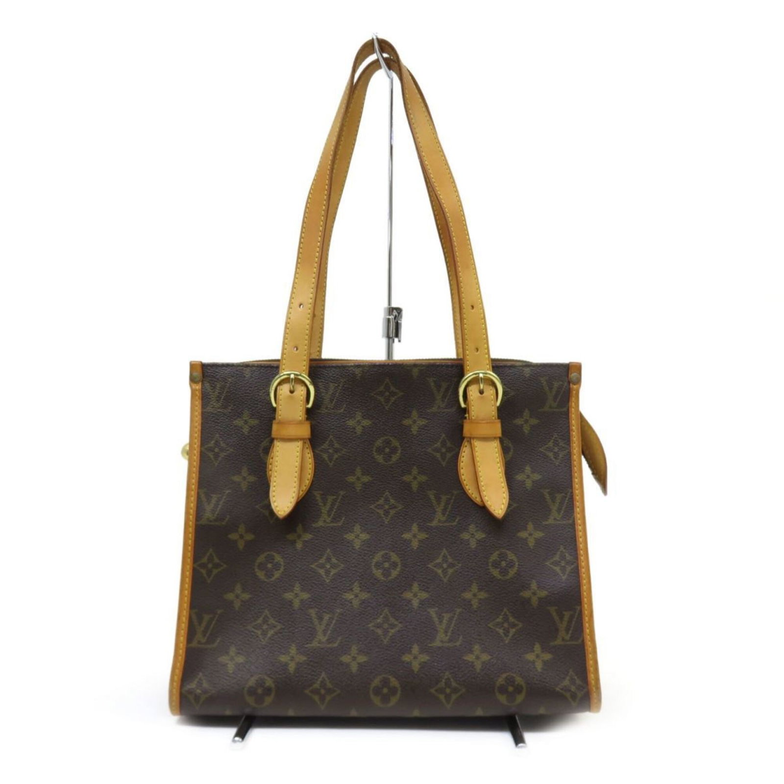 Shoulder Bag Tote Monogram Louis Vuitton: Shoulder Bag Tote Monogram Louis Vuitton Monogrammed with distinctive Louis Vuitton flair, this shoulder bag tote boasts a classic design with a timeless touch. Measuring 23cm x 27cm x 12cm, it