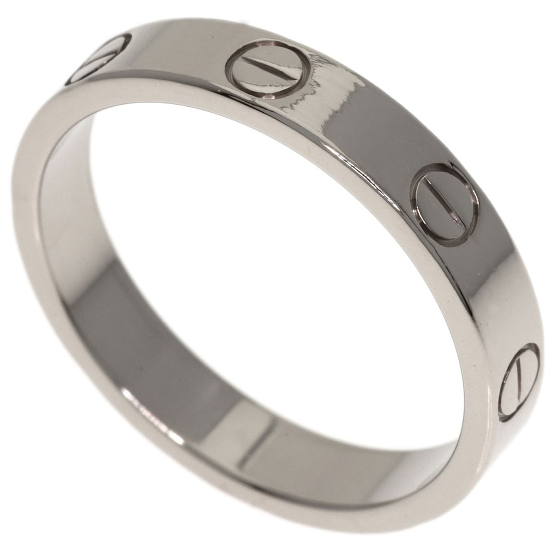 Love Ring Cartier K18 White Gold Mini: Love Ring Cartier K18 White Gold Mini K18 White Gold Mini Ring from CARTIER, featuring a sleek and modern design with a silver metal exterior and a purity of 18k gold. This miniature ring is crafted