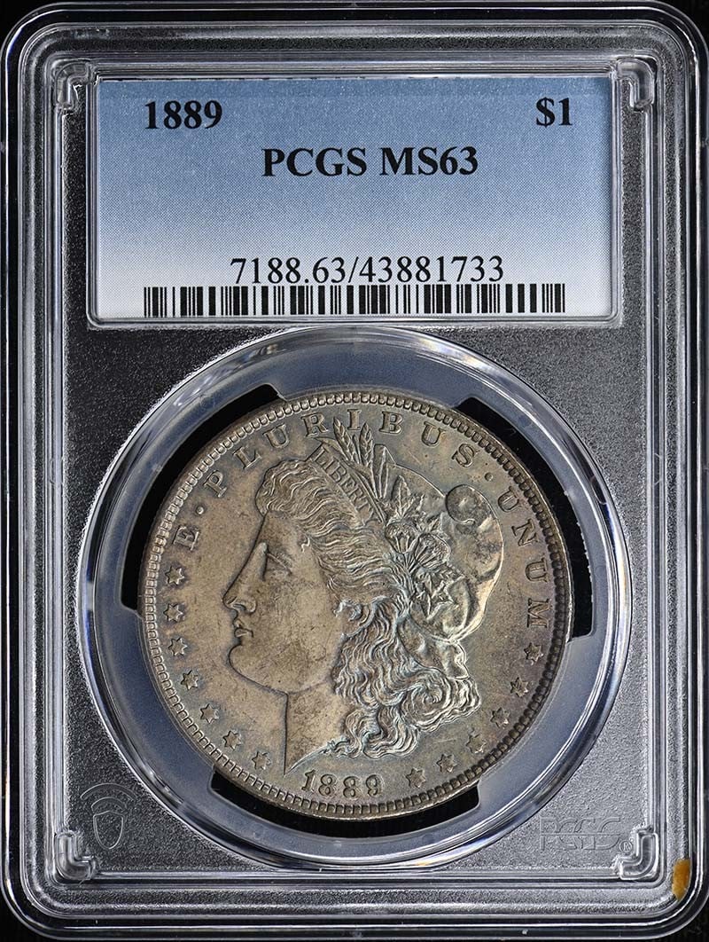 1889 $1 Morgan Dollar PCGS MS63: 1889 $1 Morgan Dollar PCGS MS63 The 1889 $1 Morgan Dollar is a highly detailed and intricately designed coin, featuring a classic design with a prominent Liberty profile on the obverse and an eagle on