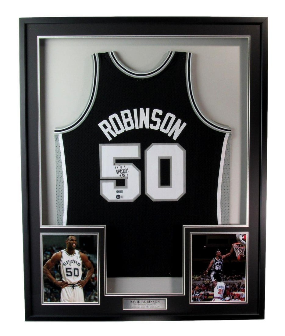 HOF Jersey Framed Autographed San Antonio Spurs David Robinson: HOF Jersey Framed Autographed San Antonio Spurs David Robinson Authentic autograph on a framed HOF jersey of NBA legend David Robinson, a San Antonio Spurs icon, bears the mark of a skilled artist. Th