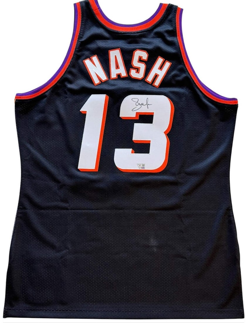 Steve Nash Suns Signed Authentic Mitchell & Ness 1996-97 Swingman Jersey (Fanati: Steve Nash Suns Signed Authentic Mitchell & Ness 1996-97 Swingman Jersey (Fanati Authentic 1996-97 Swingman Jersey from the iconic Steve Nash era, featuring a sharpie signature across the back. This