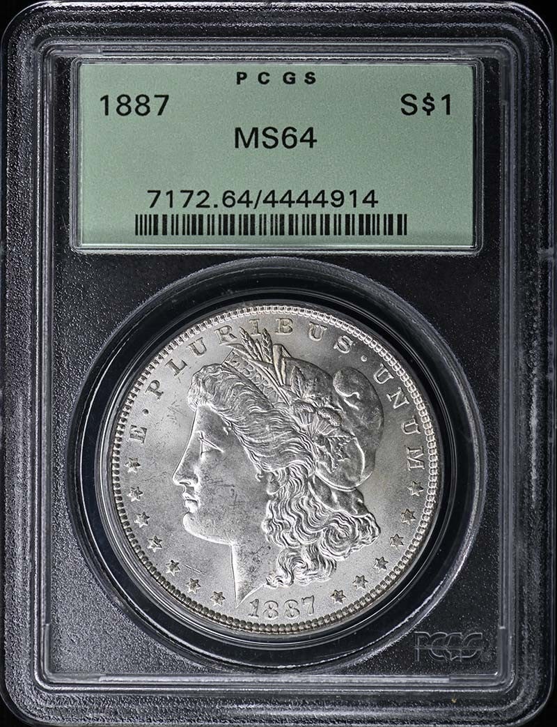 1887 $1 Morgan Dollar PCGS MS64: 1887 $1 Morgan Dollar PCGS MS64 The 1887 $1 Morgan Dollar is a highly detailed and well-crafted coin, certified by PCGS as MS64. This uncirculated coin features the iconic design of Augustus Saint-Gau