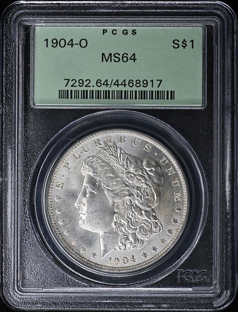 Morgan Dollar 1904-O PCGS MS64: Morgan Dollar 1904-O PCGS MS64 The 1904-O Morgan Dollar, graded MS64 by PCGS, is a highly detailed and well-preserved example of this iconic coin. Certified by the prestigious Professional Coin Gradin