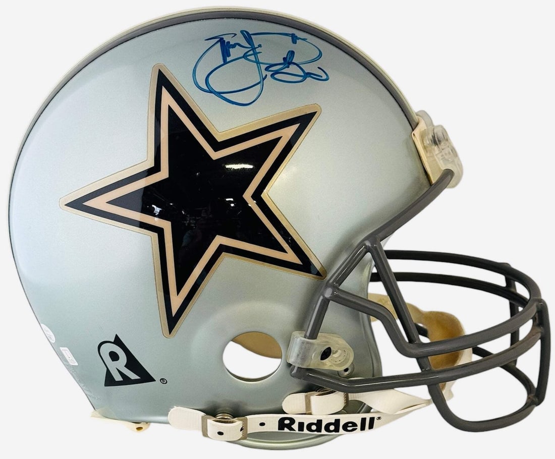 Cowboys Helmet Authentic Vintage Autographed Riddell Emmitt Smith: Cowboys Helmet Authentic Vintage Autographed Riddell Emmitt Smith Authentic vintage Riddell helmet signed by Emmitt Smith in blue sharpie across the top. This unique piece of NFL history bears the sig