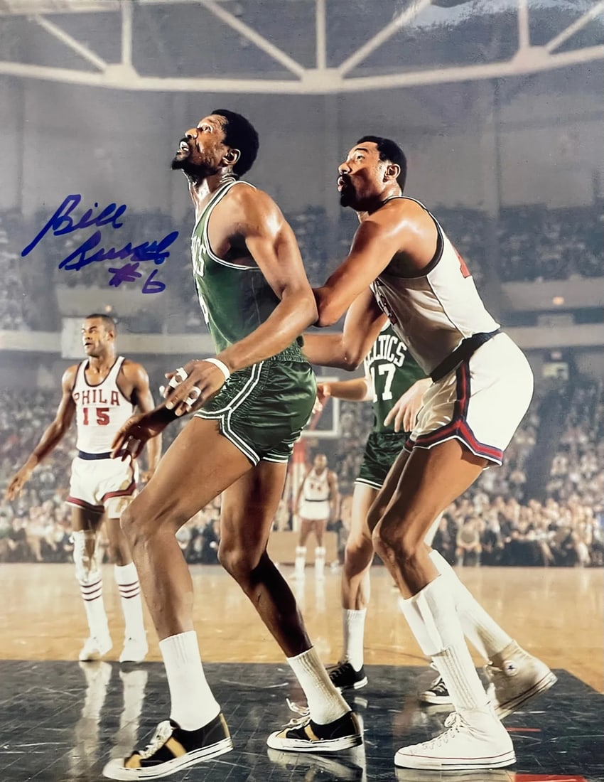 8x10 Basketball Photo Autographed By Bill Russell: 8x10 Basketball Photo Autographed By Bill Russell Signed across the front of the photo in blue sharpie, this 8x10 basketball photo bears the signature of basketball legend Bill Russell. The photo is a