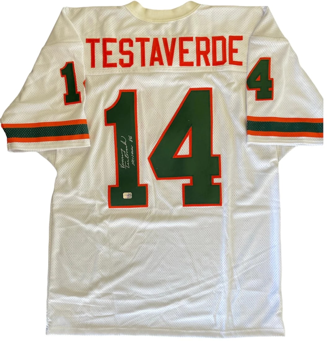Testaverde Jersey Autographed Vinny Hurricanes Miami: Testaverde Jersey Autographed Vinny Hurricanes Miami Signed by Vinny Testaverde across the number on the back of the jersey, this Miami Hurricanes football jersey bears the inscription "Heisman 86". T