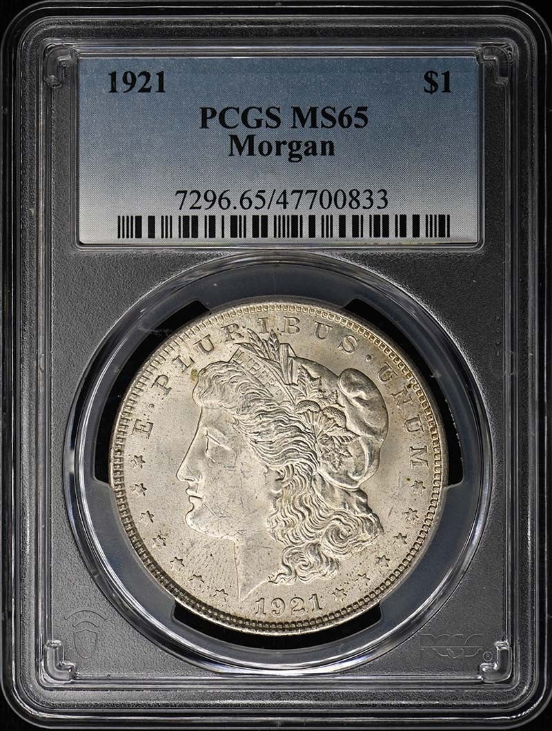 1921 $1 Morgan Dollar PCGS MS65: 1921 $1 Morgan Dollar PCGS MS65 The 1921 $1 Morgan Dollar is a highly detailed and intricately designed coin, featuring George Washington's portrait on the obverse and an eagle on the reverse. Certifi