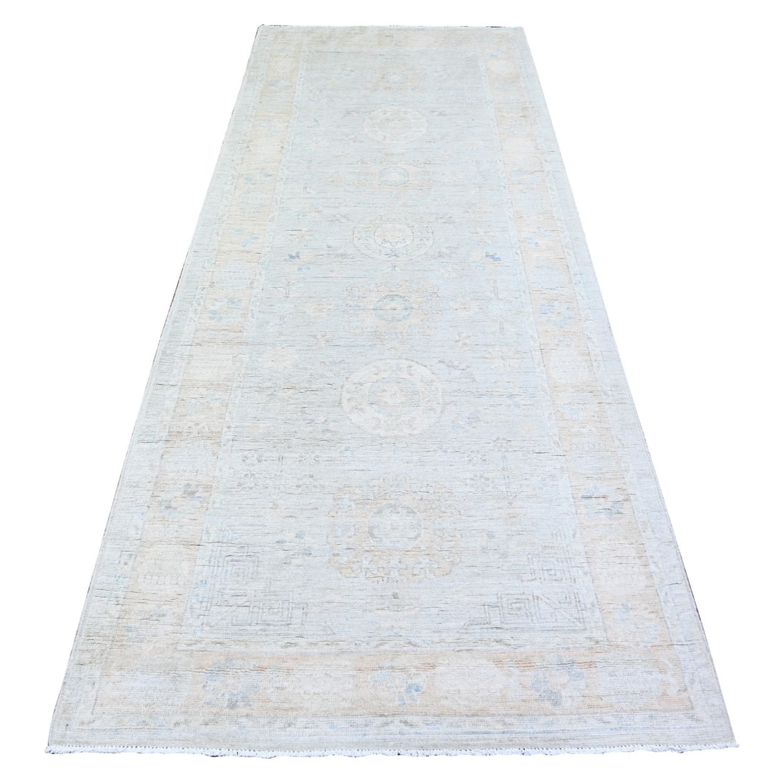 3'9"x9'7" Gray Hand Knotted White Wash Peshawar Wool Wide Runner Rug: 3'9"x9'7" Gray Hand Knotted White Wash Peshawar Wool Wide Runner Rug This stunning 3'9"x9'7" gray hand-knotted white wash peshawar wool wide runner rug boasts a classic oriental design, showcasing a t
