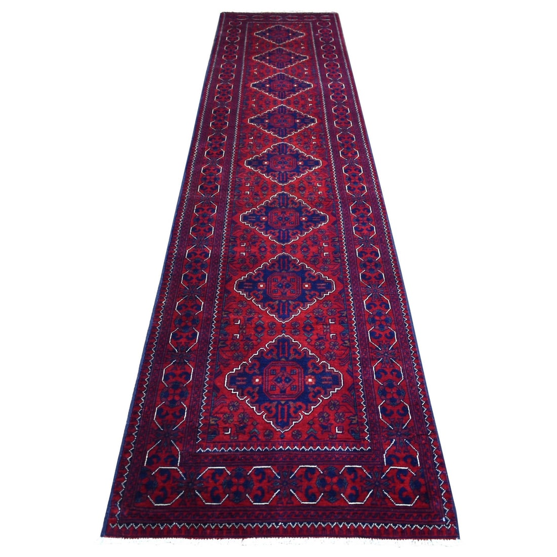 2'9"x12'10" Deep Red Afghan Khamyab Soft Wool Hand Knotted Runner Rug: 2'9"x12'10" Deep Red Afghan Khamyab Soft Wool Hand Knotted Runner Rug Deep red wool hand-knotted runner rug with a rich, vibrant color and soft texture. Measuring 2'9" x 12'10", this 100% wool Afghan 