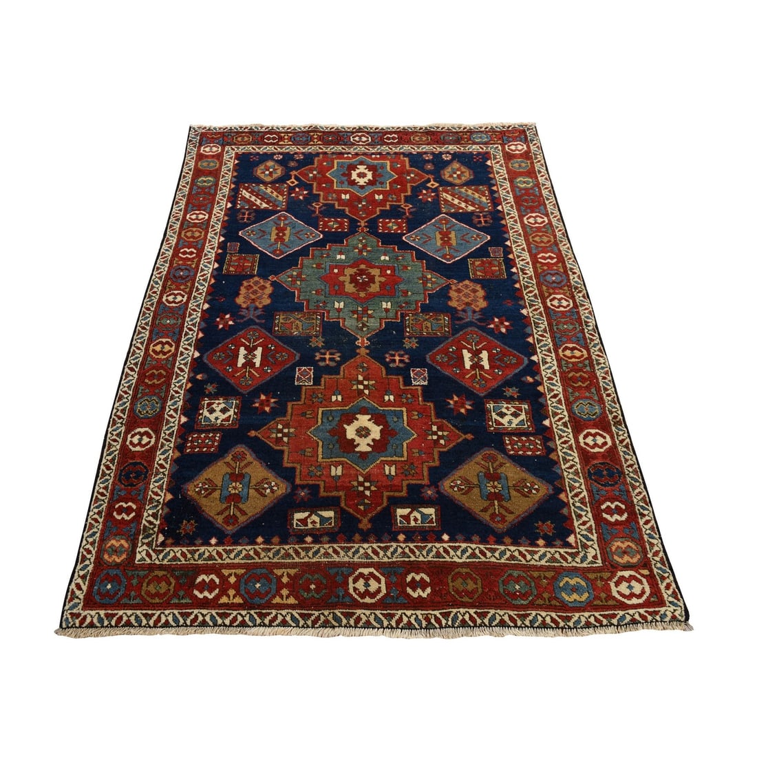 Yale Blue North West Zoroastrian Wool Hand Knotted Rug 4'1"x5'10: Yale Blue North West Zoroastrian Wool Hand Knotted Rug 4'1"x5'10 Hand-knotted in wool, this 4'1"x5'10" Zoroastrian-style rug boasts a rich blue field with intricate Oriental regional design. Made in T