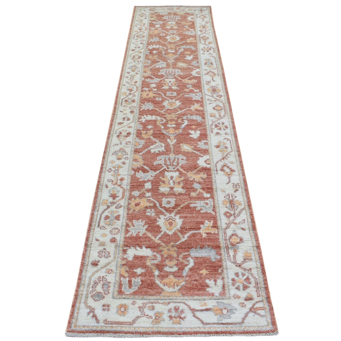 2'8"x12' Soft Wool Hand Knotted Soft Orange Angora Oushak Runner Rug: 2'8"x12' Soft Wool Hand Knotted Soft Orange Angora Oushak Runner Rug Soft and vibrant, this 2'8"x12' hand-knotted orange Angora Oushak runner rug boasts a stunning field of orange wool, complemented b