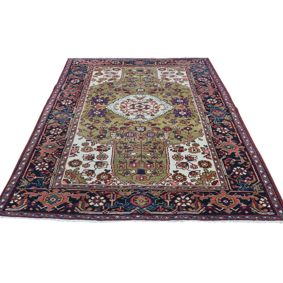 4'6"x6'4" Green Hand-Knotted Antique Heris Mint Cond Wool Oriental Rug: 4'6"x6'4" Green Hand-Knotted Antique Heris Mint Cond Wool Oriental Rug The 4'6"x6'4" Green Hand-Knotted Antique Heris Mint Cond Wool Oriental Rug boasts a stunning rectangular field with a rich green 