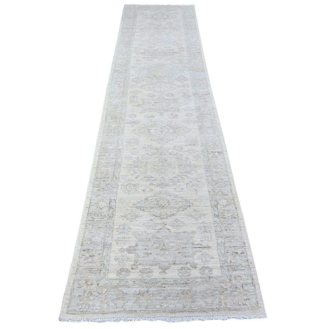 2'8"x11'3" Ivory White Wash Peshawar Hand Knotted 100% Wool Runner Rug: 2'8"x11'3" Ivory White Wash Peshawar Hand Knotted 100% Wool Runner Rug This stunning 2'8"x11'3" Ivory White Wash Peshawar Hand Knotted 100% Wool Runner Rug boasts a rich, timeless beauty with its hand