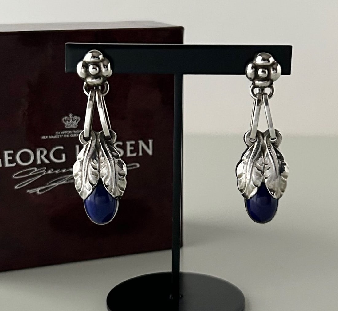 Georg Jensen 23 Lapis Lazuli Sterling Silver Dangle Earrings with Original Box: Georg Jensen 23 Lapis Lazuli Sterling Silver Dangle Earrings with Original Box Item Specifics: Brand: Georg Jensen Type: Earrings Closure: Clip-On Metal Purity: 925 Color: Silver Style: earring Main S