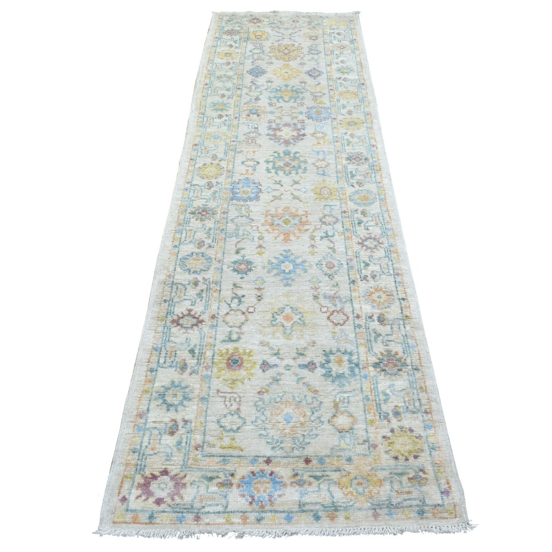2'8"x9'9" Afghan Angora Ushak Soft Wool Hand Knotted Gray Runner Rug: 2'8"x9'9" Afghan Angora Ushak Soft Wool Hand Knotted Gray Runner Rug Soft and luxurious, this 2'8"x9'9" Afghan Angora Ushak hand-knotted wool runner rug boasts a beautiful grey field with intricate or