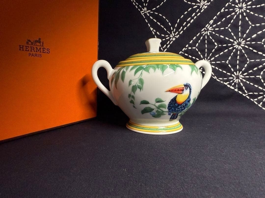 Porcelain Sugar Bowl with Lid Collectible Bird Motif Hermes Sugar Toucans: Porcelain Sugar Bowl with Lid Collectible Bird Motif Hermes Sugar Toucans Item Specifics: Brand: HERMES Type: Sugar Bowl Color: Multicolor Style: Toucans Material: Porcelain Product Disclaimer: Measur