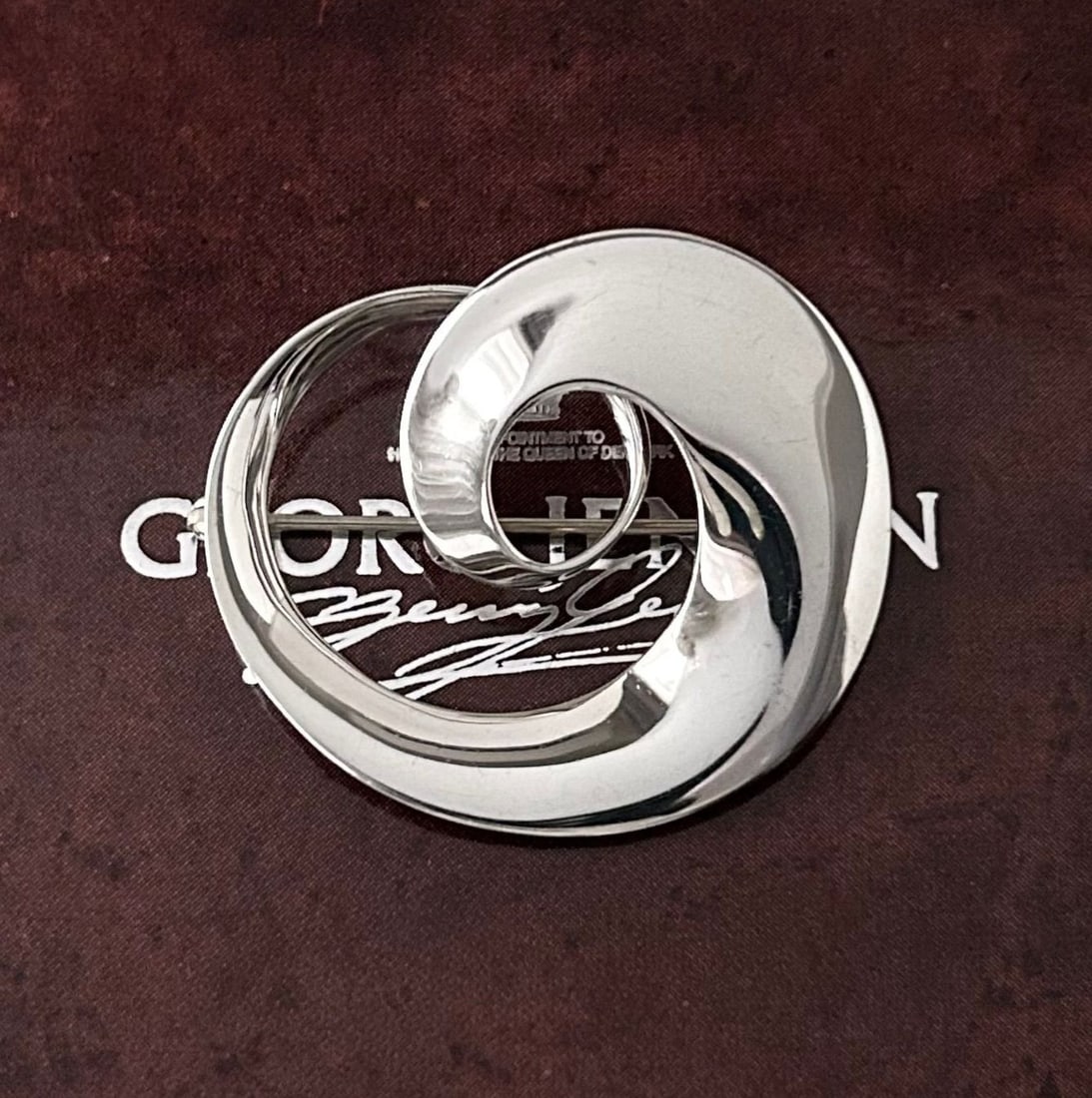 Georg Jensen 443 Torun Mobius Pin Brooch Sterling Silver with Original Box: Georg Jensen 443 Torun Mobius Pin Brooch Sterling Silver with Original Box Item Specifics: Brand: Georg Jensen Type: Brooch Metal Purity: 925 Color: Silver Base Metal: Sterling Silver Material: Metal 