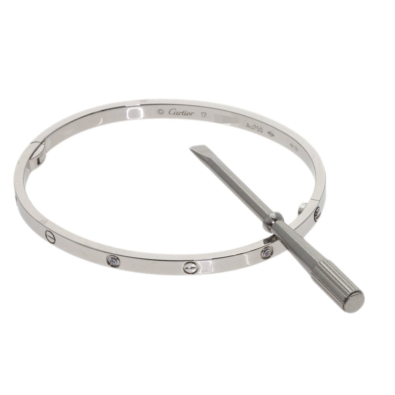 CARTIER Charm Bracelet White Gold (18K): CARTIER Charm Bracelet White Gold (18K) Cartier Charm Bracelet White Gold (18K) is a gently used, silver-toned charm bracelet made from 18K white gold. The 17cm length features minor signs of wear, wi