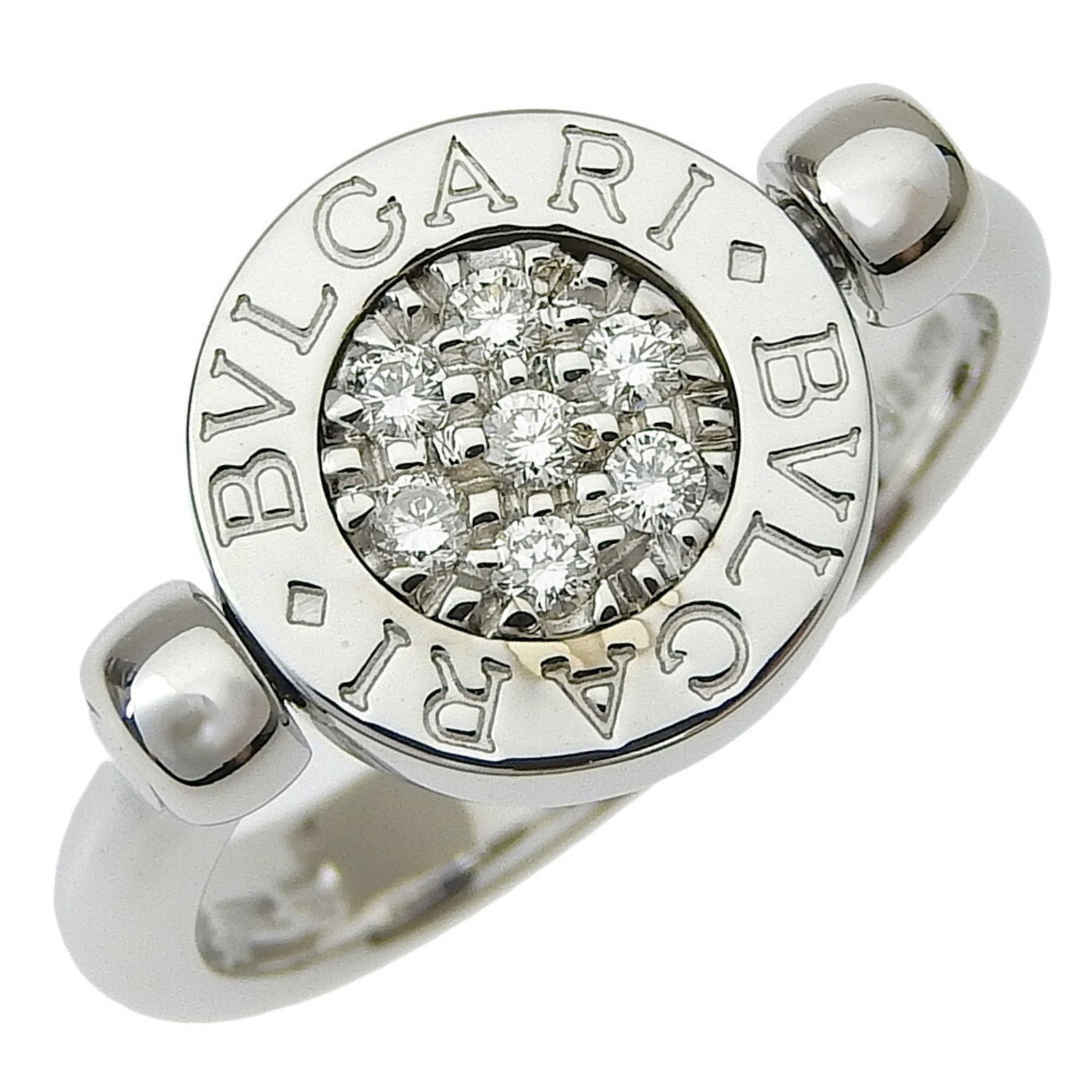 BVLGARI Band Ring White Gold (18K): BVLGARI Band Ring White Gold (18K) Bvlgari Band Ring in White Gold Features a Diamond and Lapis Lazuli Stone, Set in 18K White Gold. This 18K White Gold Band Ring is a classic design with a diamond