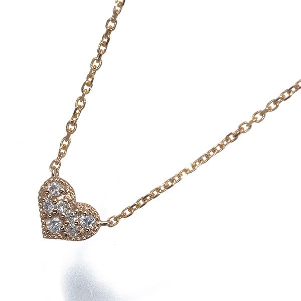 Agete Necklace Diamond 0.04Ct Paved Heart 18K 750 Rose Gold: Agete Necklace Diamond 0.04Ct Paved Heart 18K 750 Rose Gold The Agete Necklace Diamond 0.04Ct Paved Heart 18K 750 Rose Gold is a delicate 18k rose gold necklace featuring a 0.04ct diamond pave heart p