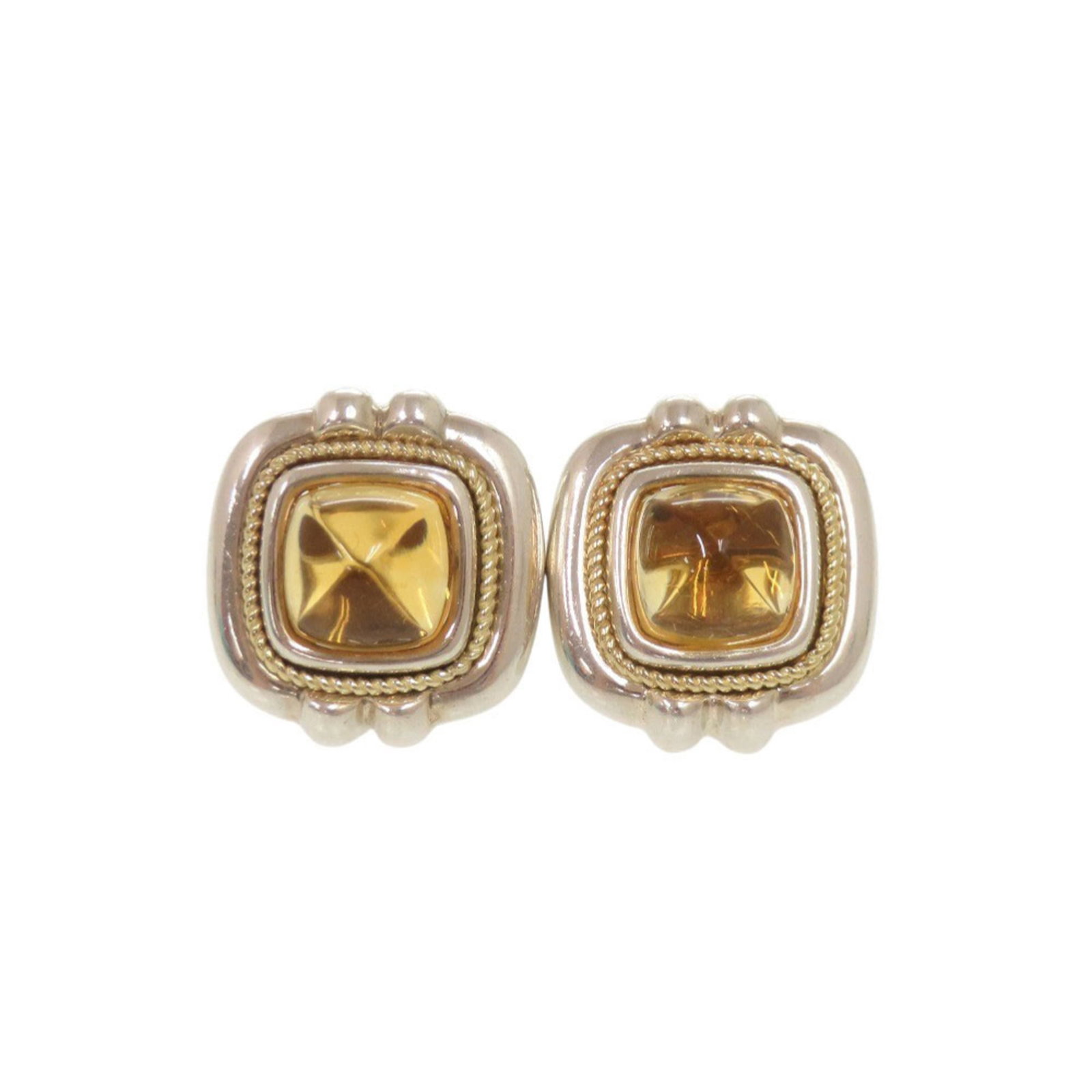TIFFANY Stud Earrings Silver 925 Yellow Gold (18K): TIFFANY Stud Earrings Silver 925 Yellow Gold (18K) Stud earrings featuring a vibrant citrine stone set in silver 925 and yellow gold (18K) details, adding a touch of elegance to any outfit. The 18K