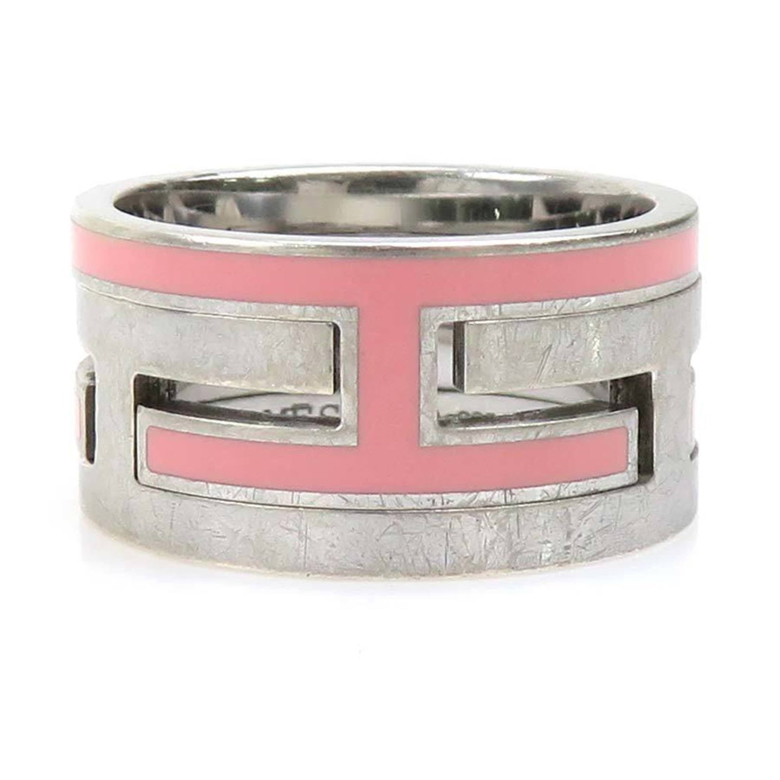 HERMES Band Ring Enamel Silver 925: HERMES Band Ring Enamel Silver 925 Enamel silver 925 band ring from Hermes, available in pink. This ring features a durable silver 925 construction and a vibrant pink enamel finish. With visible wear