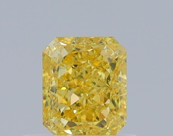 GIA Radiant 0.6ct Fancy Vivid Yellow VVS2 - Loose Natural Diamond: GIA Radiant 0.6ct Fancy Vivid Yellow VVS2 - Loose Natural Diamond GIA-certified, this 0.6ct Fancy Vivid Yellow VVS2 diamond boasts exceptional clarity and color, with a radiant appearance that shines