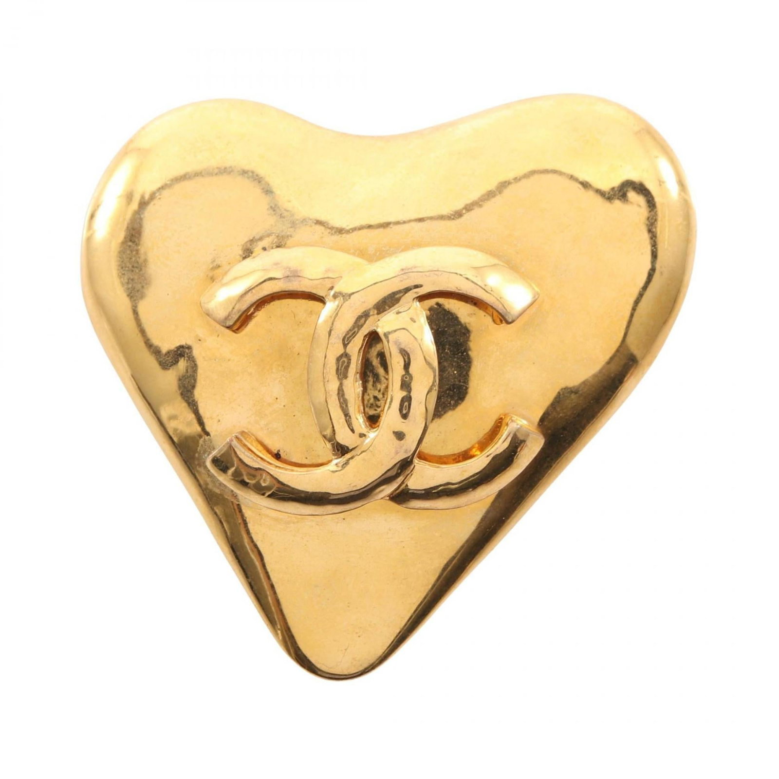 CHANEL Brooch Gold Plating: CHANEL Brooch Gold Plating Gold plated brooch from the iconic CHANEL brand, featuring a sleek design that adds a touch of elegance to any outfit. Measuring 5cm x 5.5cm, this gently used brooch showcas