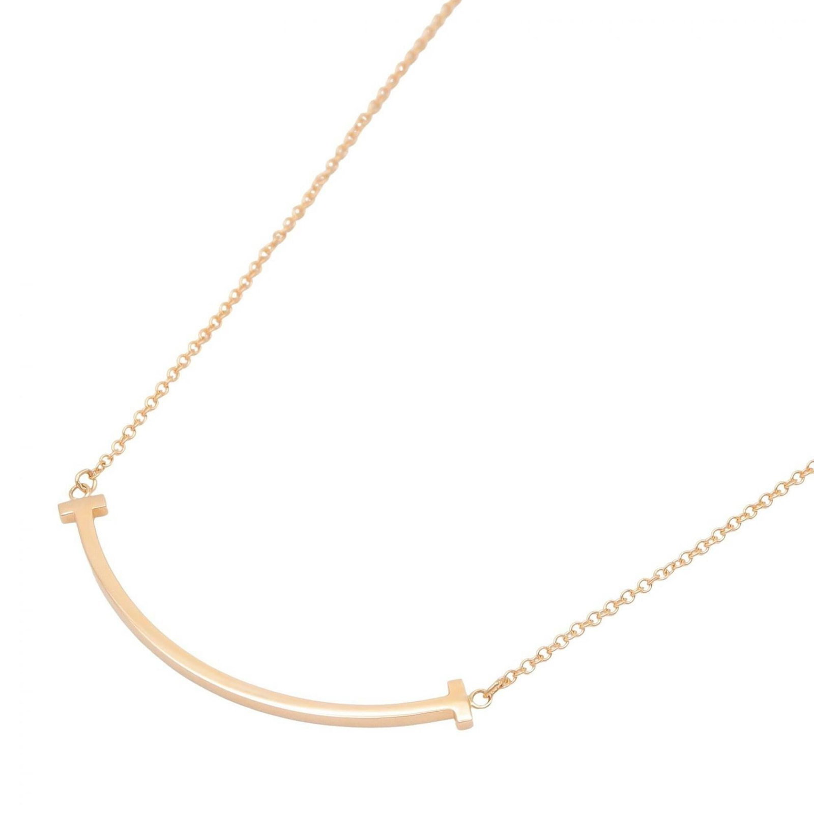 TIFFANY Pink Gold (18K): TIFFANY Pink Gold (18K) Pink gold (18K) Tiffany necklace with a 37mm x 3.6mm pendant, available in a 40.5 cm - 45.5 cm neck circumference. This gently used necklace features minor signs of wear, inclu