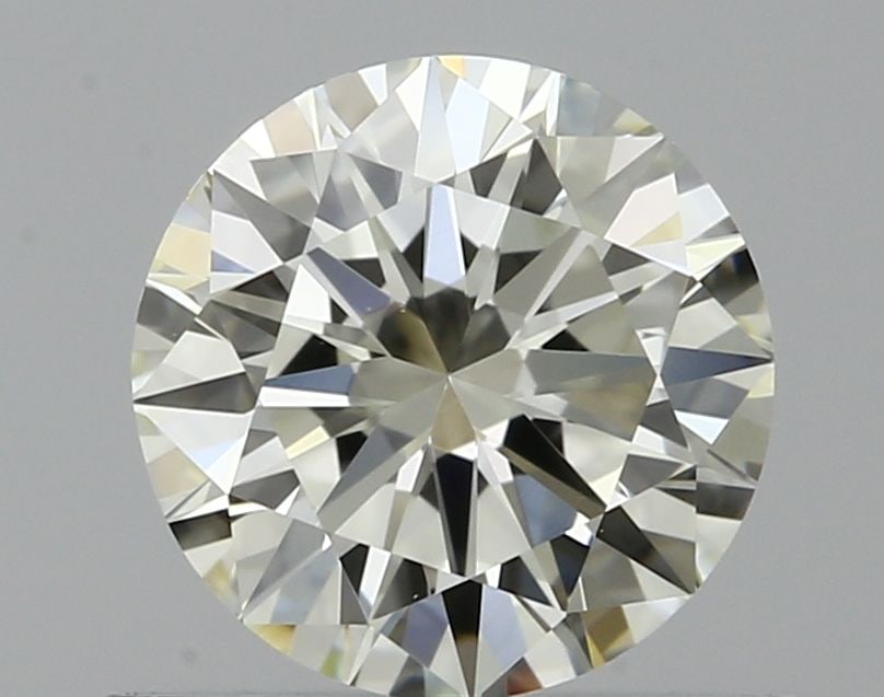 IGI Round 0.57ct J VVS1 - Loose Natural Diamond: IGI Round 0.57ct J VVS1 - Loose Natural Diamond 0.57ct IGI Round Diamond in Excellent ConditionThis natural diamond boasts a vibrant J color and exceptional VVS1 clarity, making it a standout gem.