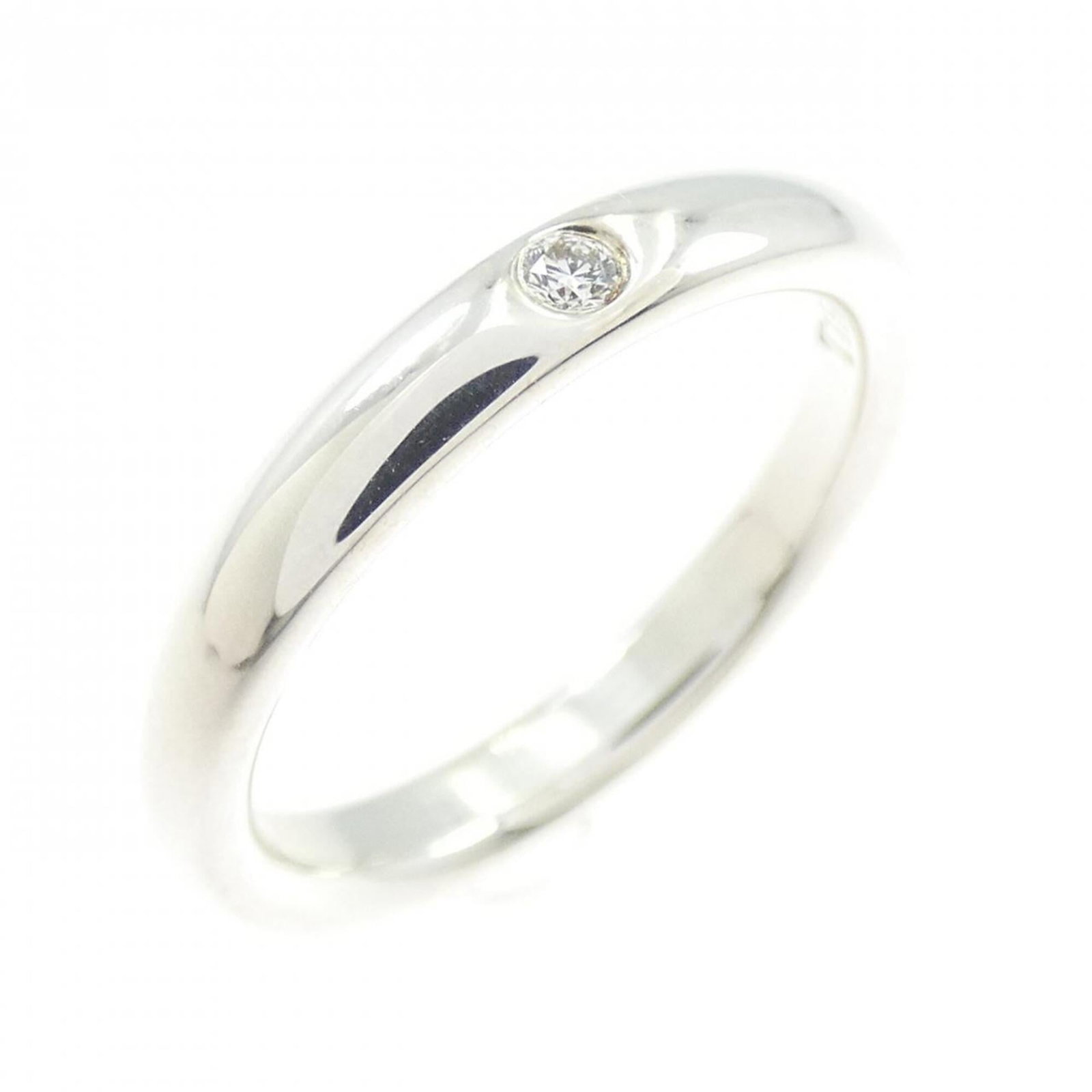TIFFANY Band Ring Silver 925: TIFFANY Band Ring Silver 925 Silver 925 band ring from Tiffany, featuring a diamond stone, available in US size 4. This like new used ring boasts excellent condition with no visible wear, making it a