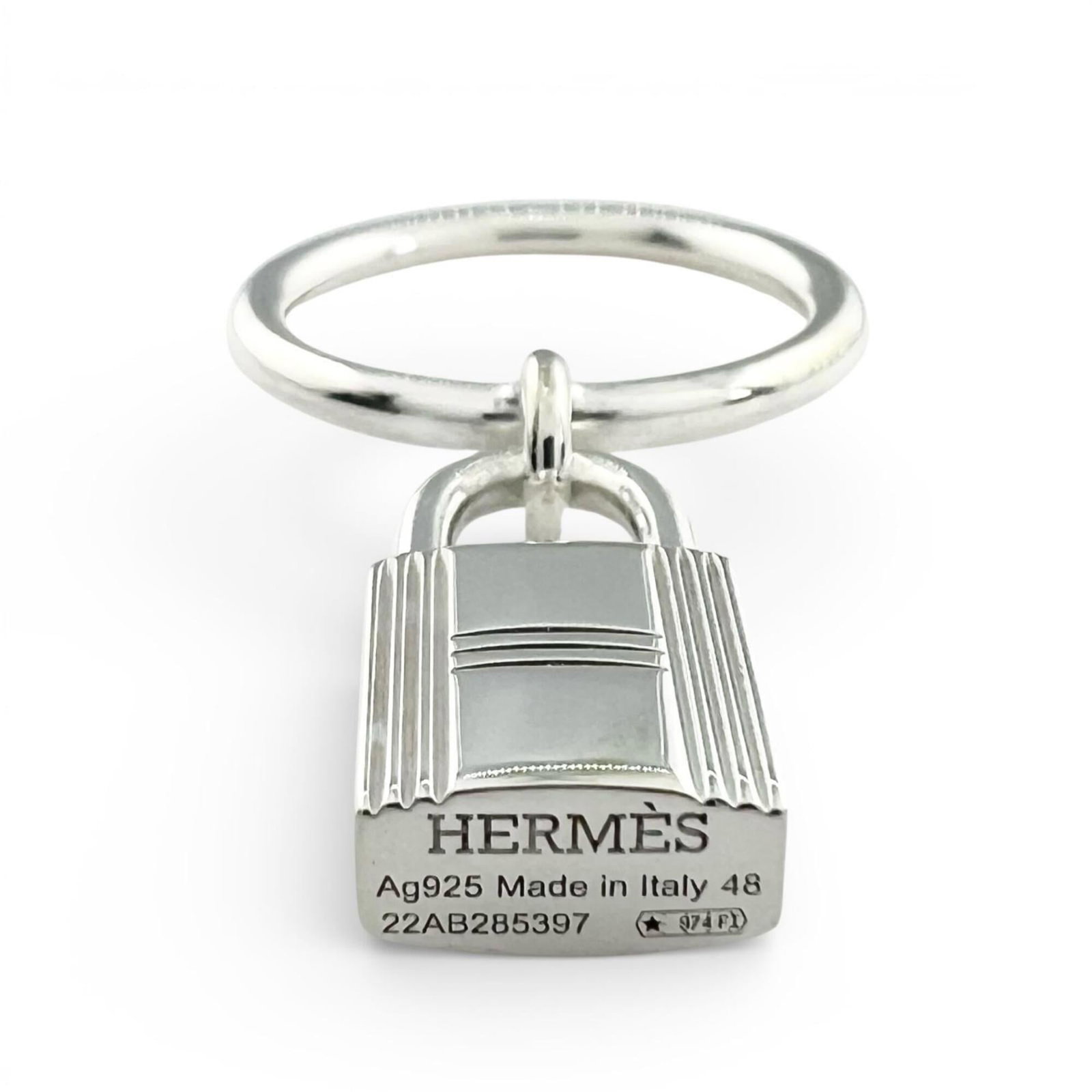 HERMES Band Ring Silver 925: HERMES Band Ring Silver 925 Silver 925 band ring from Hermes, crafted in Italy with a sleek 2mm width and 4.5 US size. This like-new used ring boasts a subtle 48mm size and weighs 5.2g, making it a