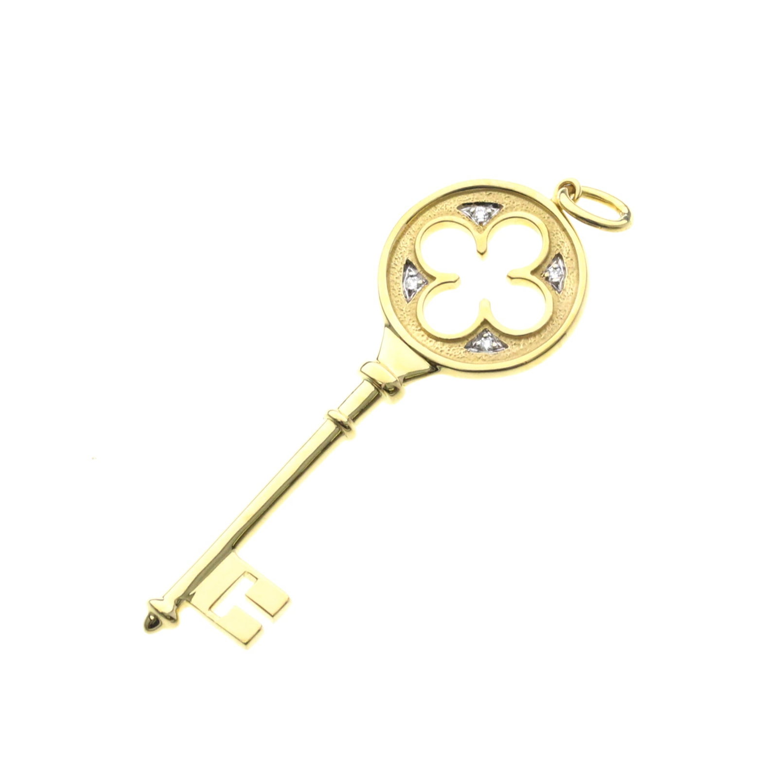 TIFFANY Yellow Gold (18K): TIFFANY Yellow Gold (18K) Yellow gold (18K) Tiffany Clover Key Pendant Top Necklace is a fashion statement piece. This 53.5mm x 17.8mm pendant features a 7g diamond, set in a 7g yellow gold (18K) top 