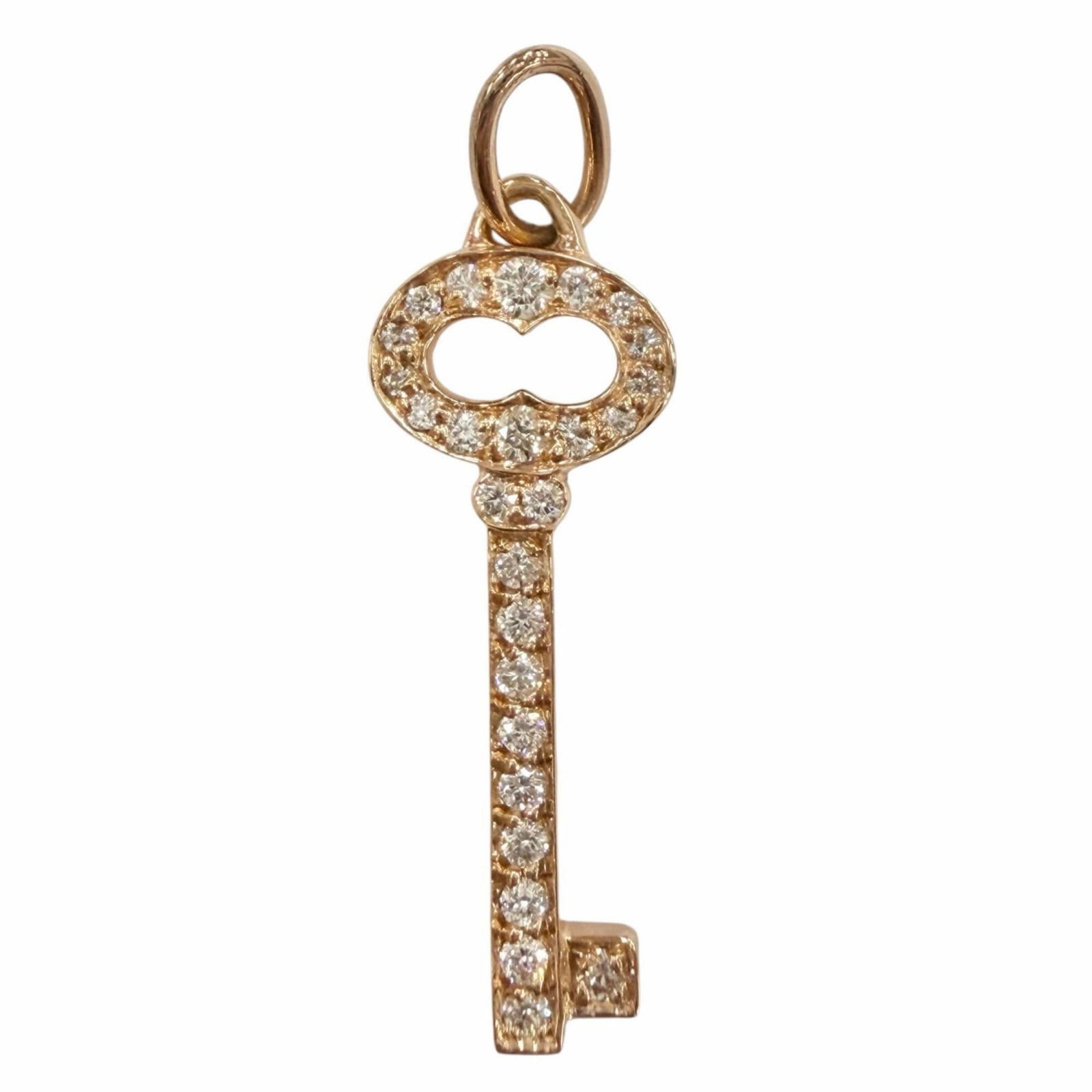 TIFFANY Pink Gold (18K): TIFFANY Pink Gold (18K) Pink gold (18K) pendant with a 20mm x 8mm diamond, crafted in a timeless Tiffany design. This elegant necklace features a subtle pink hue and a refined 20mm x 8mm diamond,
