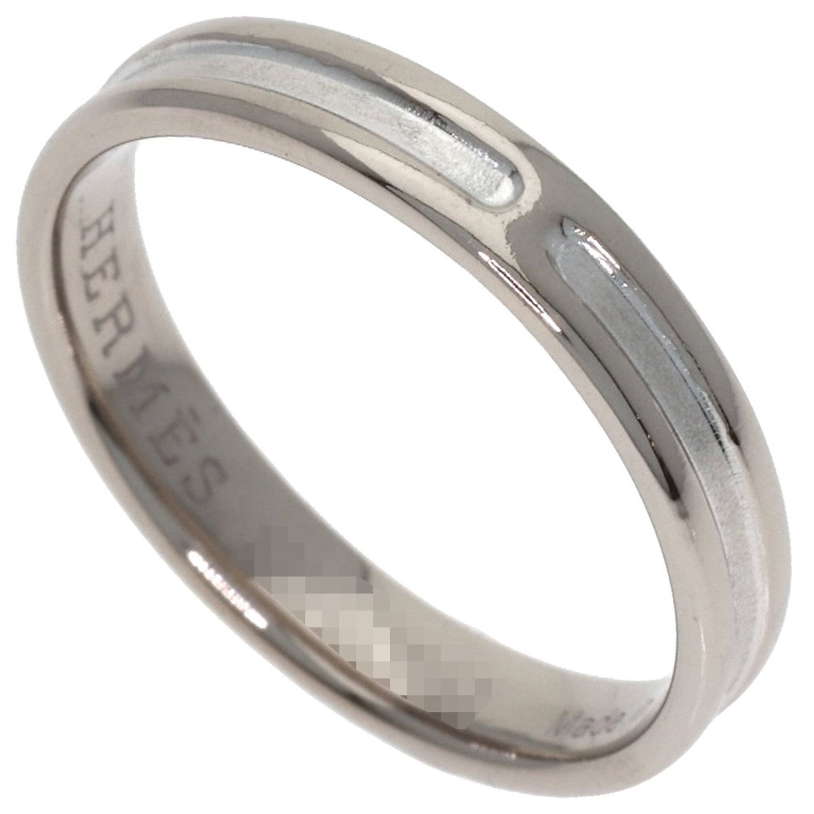 HERMES Band Ring White Gold (18K): HERMES Band Ring White Gold (18K) White gold (18K) band ring from Hermes, featuring a classic design that exudes elegance. The item is in very good condition, gently used with minor signs of wear,