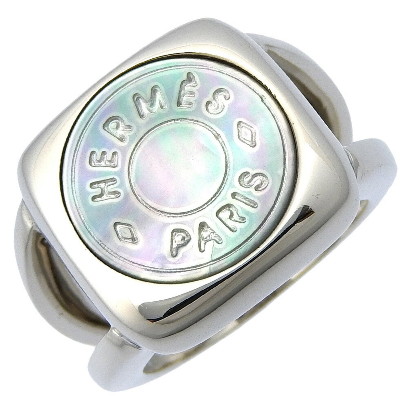 HERMES Band Ring Shell Silver 925: HERMES Band Ring Shell Silver 925 Silver shell band ring from Hermes' Sellier line, featuring a shell stone and 925 silver construction. This ring is a unique piece with visible wear, including scratc