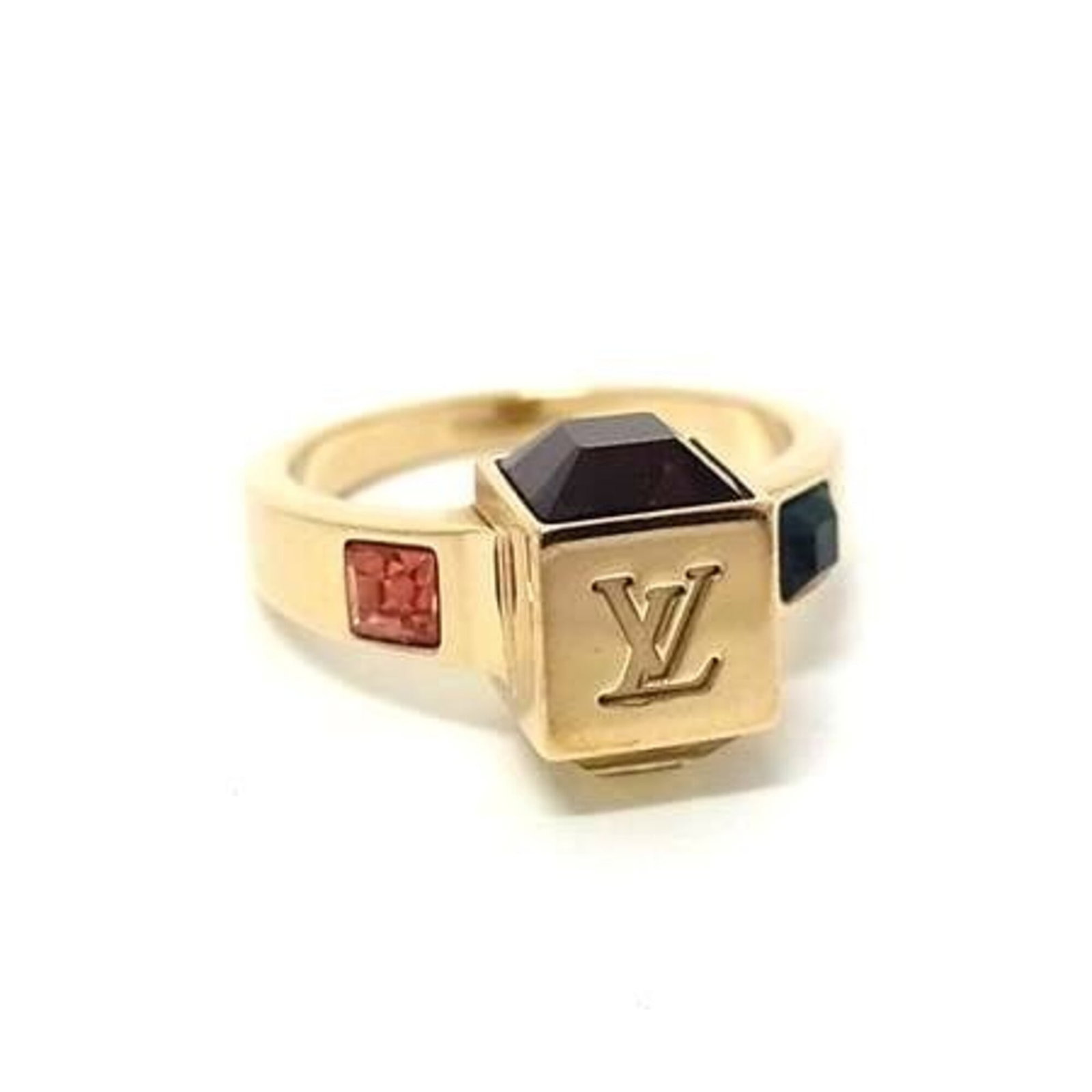 LOUIS VUITTON Band Ring Metal: LOUIS VUITTON Band Ring Metal Gold metal band ring from Louis Vuitton's Gamble line, featuring a rhinestone stone. This gently used band ring showcases minor signs of wear, with small scratches or