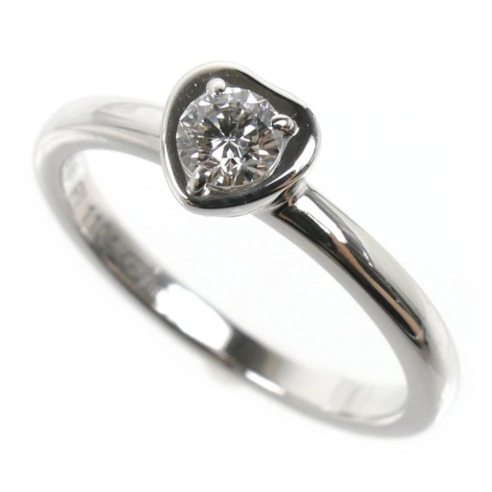 CARTIER Band Ring White Gold (18K): CARTIER Band Ring White Gold (18K) Cartier Band Ring in White Gold (18K) - A stylish and elegant design from the renowned French luxury brand. This gently used band ring features a diamond stone and