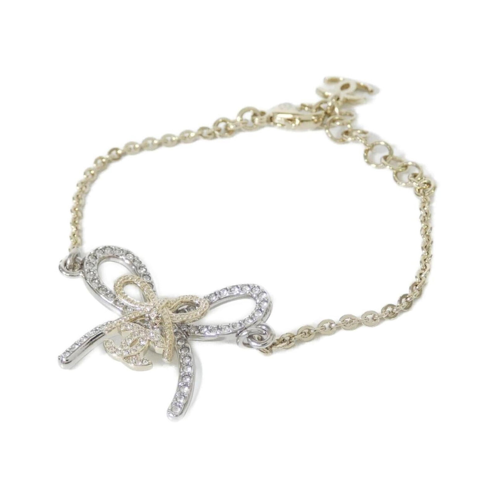 CHANEL Charm Bracelet Gold: CHANEL Charm Bracelet Gold Gold Charm Bracelet from Chanel, featuring a 15cm-18cm length and a very good condition with minor signs of wear. The bracelet bears a signature, but details of the artist