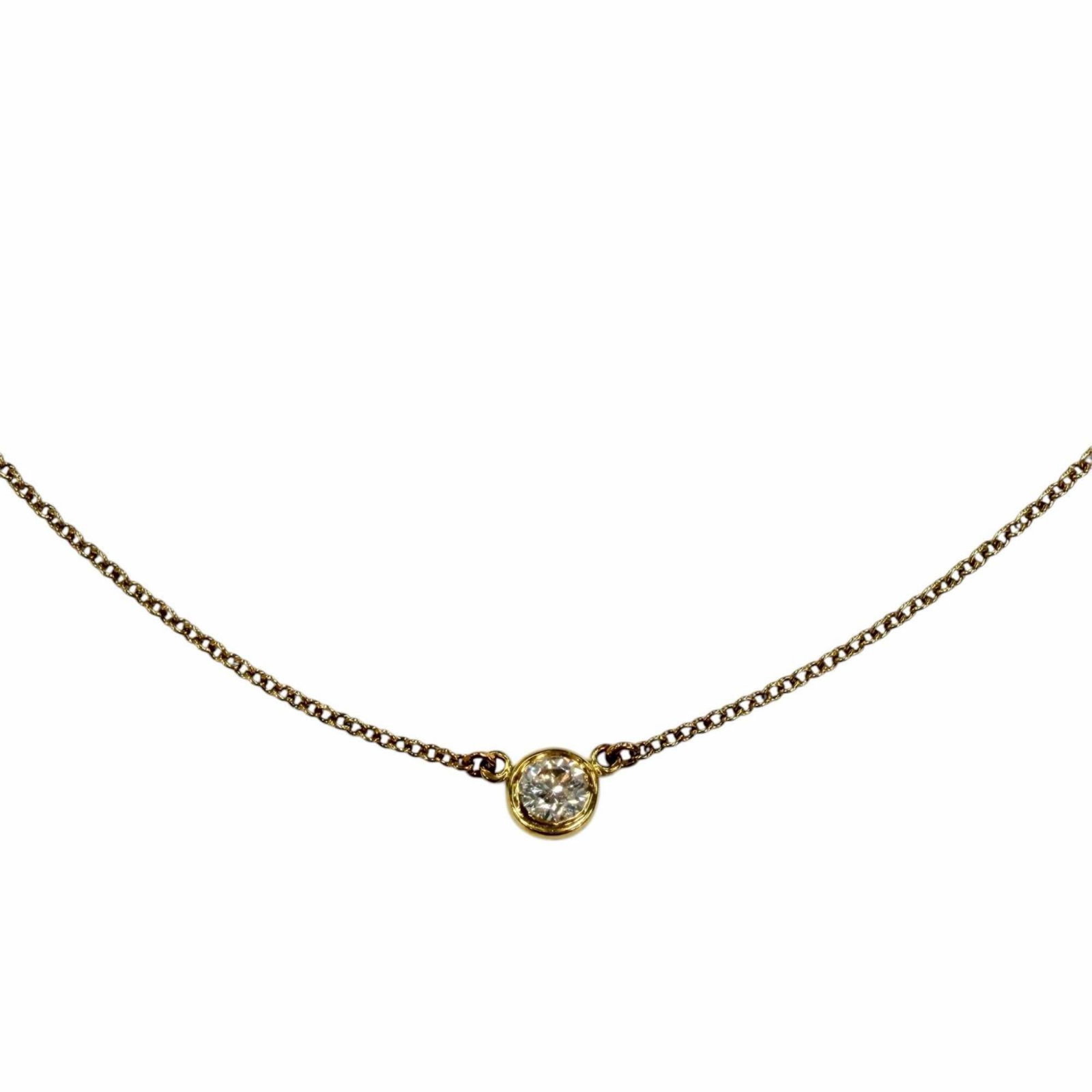 TIFFANY Yellow Gold (18K): TIFFANY Yellow Gold (18K) Yellow gold (18K) Tiffany necklace with a diamond pendant, offering a touch of elegance and sophistication. The 40.5 cm necklace features a 4.45mm diamond pendant, set in a d