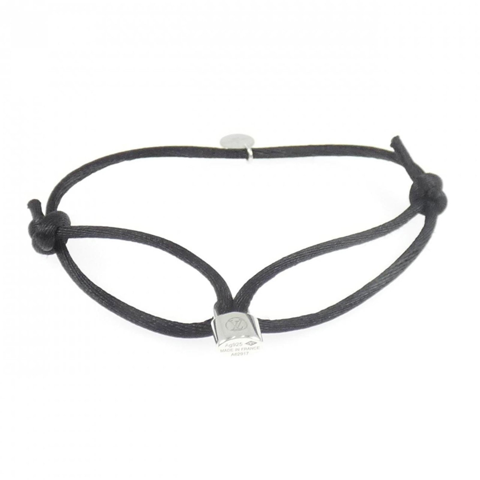 LOUIS VUITTON Charm Bracelet Silver 925: LOUIS VUITTON Charm Bracelet Silver 925 Silver 925 Charm Bracelet from Louis Vuitton, featuring a classic design with a touch of elegance, gently used with minor signs of wear. The item is in very