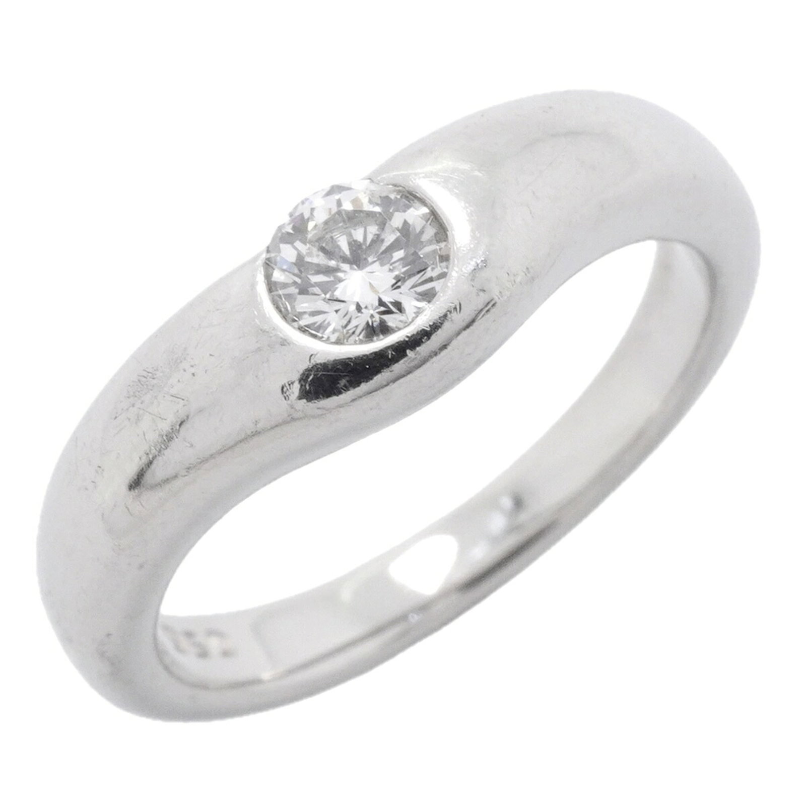TIFFANY Band Ring Platinum 950: TIFFANY Band Ring Platinum 950 Platinum 950 Tiffany band ring features a diamond stone and is made from high-quality platinum. The ring is in good condition with visible wear, including scratches and