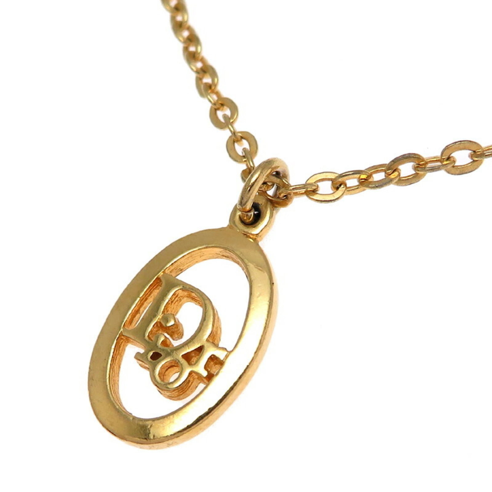 CHRISTIAN DIOR Gold Plating: CHRISTIAN DIOR Gold Plating Gold plating from Christian Dior adds a touch of luxury to any outfit. This 44 cm necklace features a 19.2mm x 11.6mm pendant and is made from gold plating, with visible
