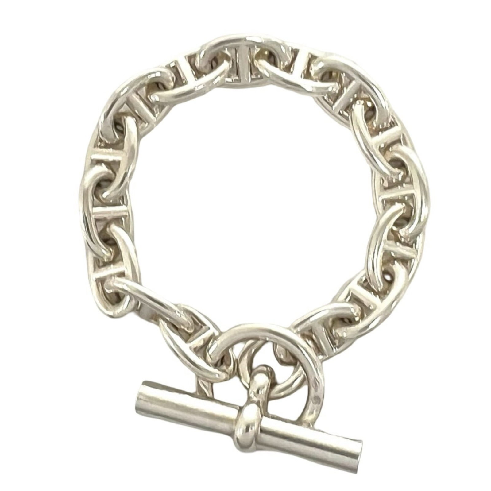 HERMES Charm Bracelet Silver 925: HERMES Charm Bracelet Silver 925 Silver 925 charm bracelet from Hermes features a sleek design with visible wear, scratches, and scuffs. The item is made from high-quality silver and measures 13cm in