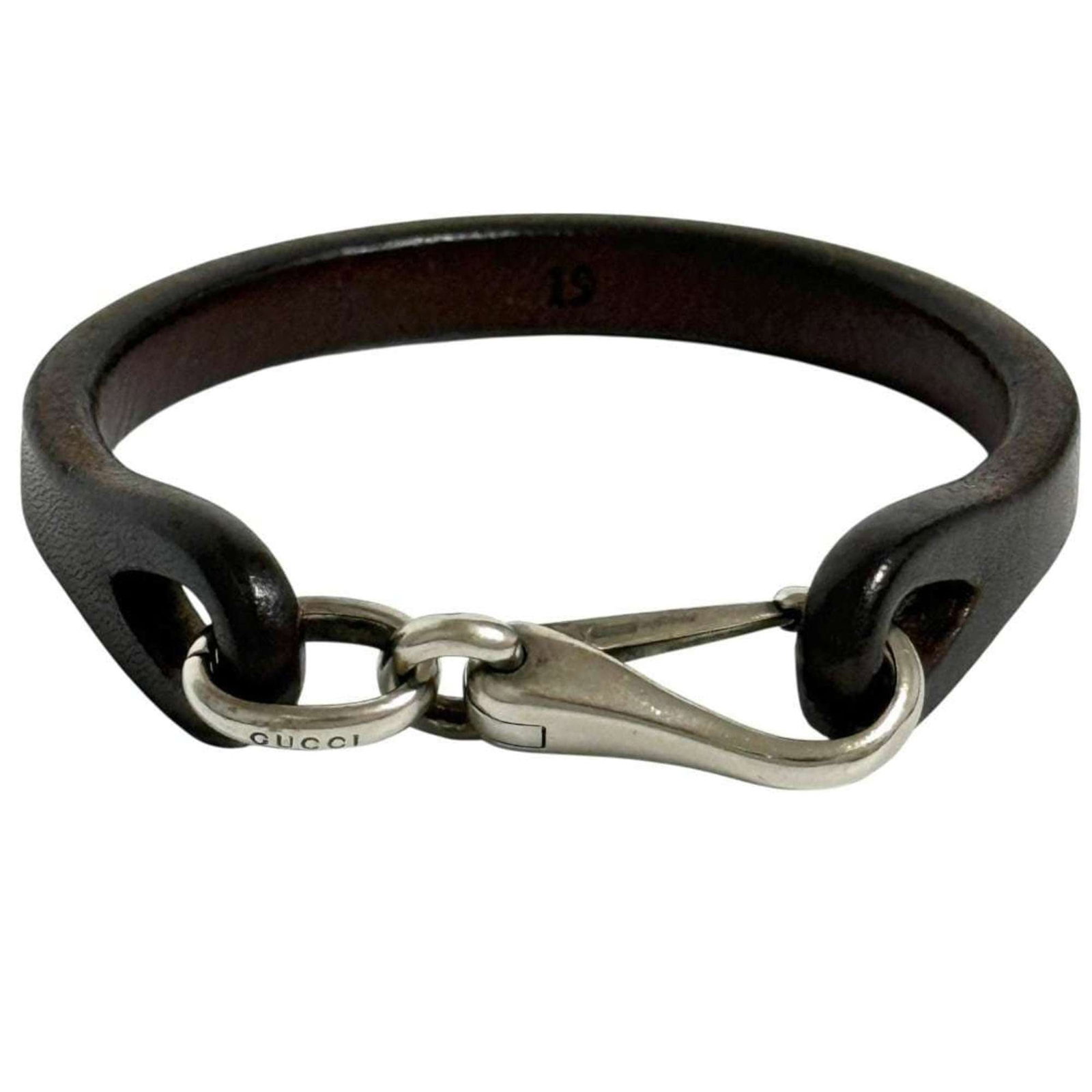 GUCCI Charm Bracelet Leather Silver 925: GUCCI Charm Bracelet Leather Silver 925 Leather and silver 925 charm bracelet from Gucci, available in brown and dark brown colors, with a length of 19cm. This used charm bracelet features scratches,